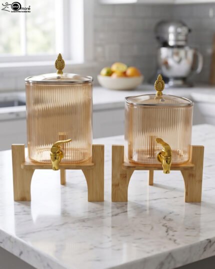 Ribbed amber glass beverage dispenser with gold tap and pineapple lid finial on a wooden stand