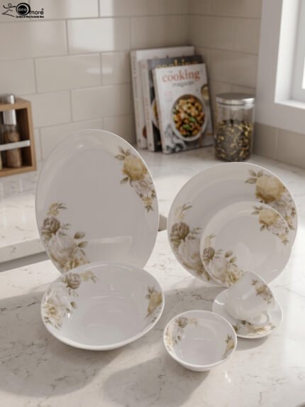 32-piece white ceramic dinnerware set featuring elegant yellow and white floral rose prints displayed on a marble countertop