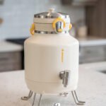Bangor 5L cream insulated beverage cooler dispenser with stainless steel tap and foldable stand legs