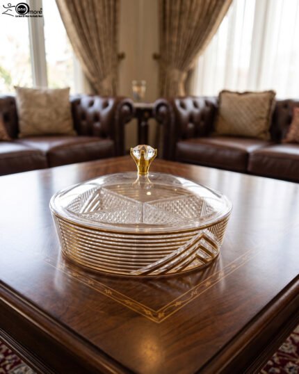 Medium and large luxury crystal dry fruit dishes with gold detailing and crystal-knob lids, displayed on a wooden coffee table.