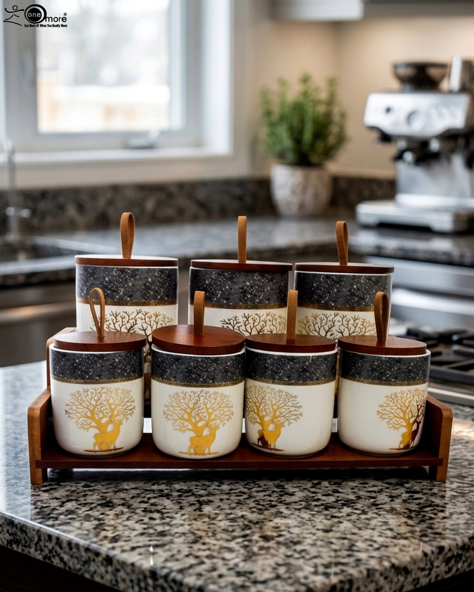 1 Luxury ceramic kitchen jar set with golden tree and deer patterns, wooden lids with loop handles, and a matching wooden display stand on a kitchen countertop.