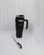 : An array of colorful 1.2L stainless steel tumblers with handles and clear lids displayed on a kitchen counter