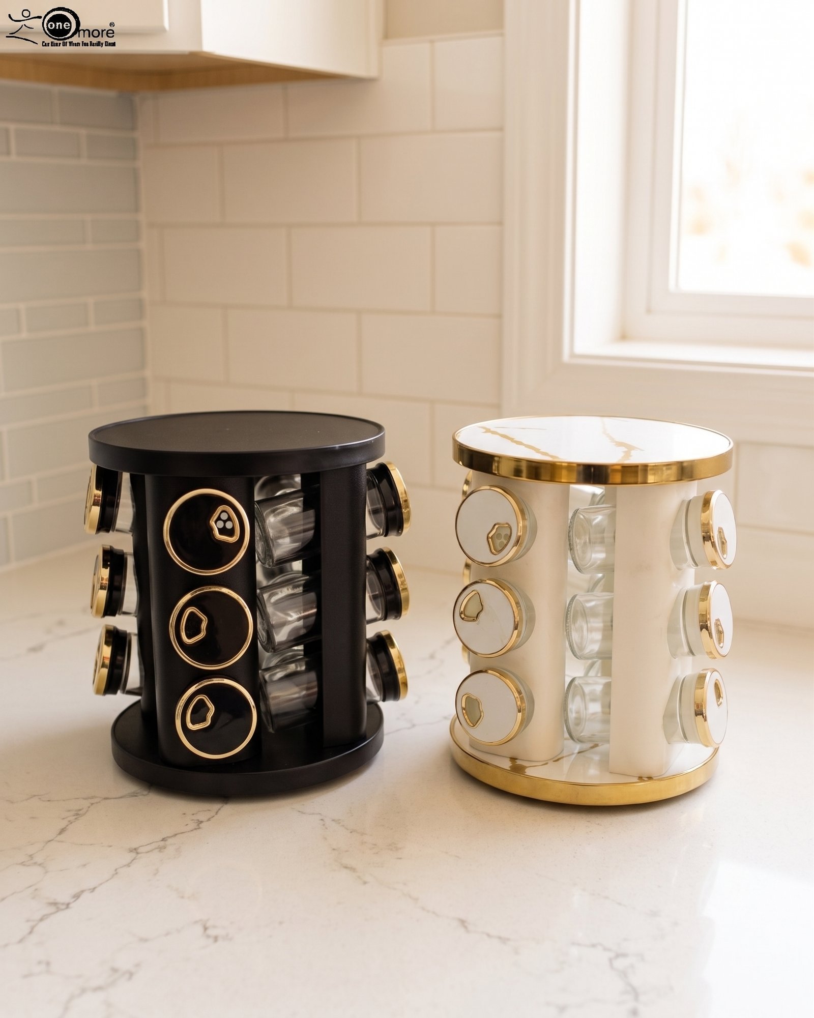 2 9-piece matte black and gold luxury spice rack set with clear glass bottoms on a granite countertop.