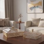 Two luxury clear acrylic dry fruit serving dishes with gold trim, crystal knobs, and partitioned compartments displayed on a modern wooden coffee table.