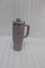 A collection of 900ml insulated "Nice Time Sitarayuri Coffee" tumblers with handles displayed in various colors on a kitchen counter.