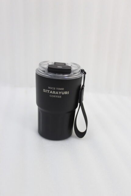 Line-up of colorful 360ml stainless steel travel tumblers with matching carrying straps and clear lids displayed on a kitchen counter.