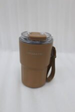 Line-up of colorful 360ml stainless steel travel tumblers with matching carrying straps and clear lids displayed on a kitchen counter.