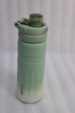 Four pastel gradient Dodge 560mL stainless steel water bottles lined up on a kitchen counter.