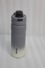 Four pastel gradient Dodge 560mL stainless steel water bottles lined up on a kitchen counter.
