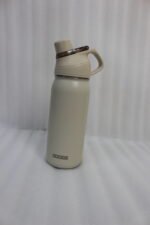 Four Dodge 630mL stainless steel water bottles in black, sage green, grey, and beige lined up on a kitchen counter.