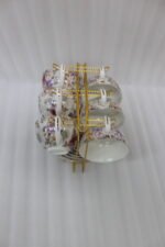 Elegant Ceramic Tea Cup and Saucer Set with Golden Stand - Image 2