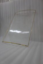 Nesting clear acrylic serving tray set with elegant gold trim and built-in handles, displayed on a modern kitchen countertop.