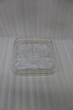 Two elegant crystal dry fruit dishes with gold rims and clear ball-knob lids, displayed in Medium and Large sizes on a table.