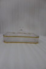 Elegant rectangular crystal dry fruit dish with multiple compartments, gold trim, and a matching lid placed on a wooden table.