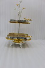 Luxury 2-tier decorative serving tray with textured gold base, silver borders, and ornate floral top handle.