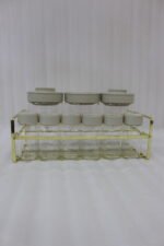 9-piece clear glass spice jar set with grey lids and a gold wire countertop rack