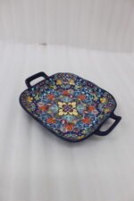 Vibrant blue 9.5-inch decorative Marrakech ceramic serving bowl with handles featuring a colorful mandala pattern on a rustic wooden table.