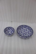 Pair of blue and white handcrafted decorative Marrakesh ceramic bowls in 5-inch and 8-inch sizes on a marble countertop