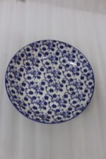 8-inch ceramic decorative Marakesh bowl with intricate blue and white floral pattern resting on a white countertop