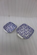 Square ceramic Marrakesh serving dish with blue and white floral pattern resting on a kitchen countertop