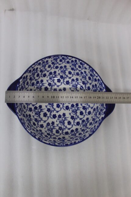 9.5-inch decorative Marrakesh ceramic bowl with blue and white floral pattern on a kitchen counter