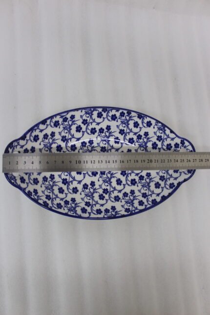 10.5-inch oval decorative Marrakesh ceramic serving dish with blue floral motif and side handles