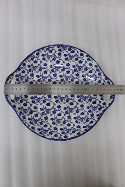 11-inch decorative Marrakech serving dish with blue and white floral ceramic pattern and built-in side handles