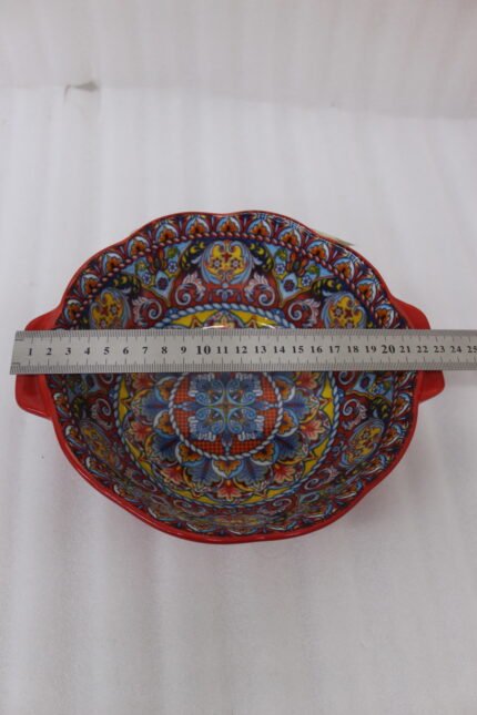 Decorative Marrakesh double handle ceramic serving bowls with colorful Moroccan pattern on a wooden kitchen island