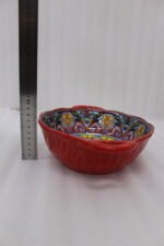 Decorative Marrakesh double handle ceramic serving bowls with colorful Moroccan pattern on a wooden kitchen island