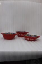 Decorative Marrakesh double handle ceramic serving bowls with colorful Moroccan pattern on a wooden kitchen island