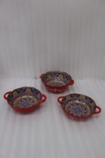 Decorative Marrakesh double handle ceramic serving bowls with colorful Moroccan pattern on a wooden kitchen island