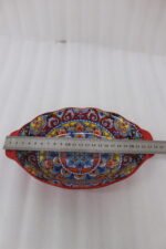 9.5-inch decorative Marrakesh ceramic serving bowl with colorful Moroccan mandala patterns on a kitchen countertop