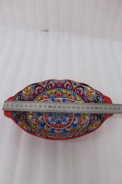 9.5-inch decorative Marrakesh ceramic serving bowl with colorful Moroccan mandala patterns on a kitchen countertop