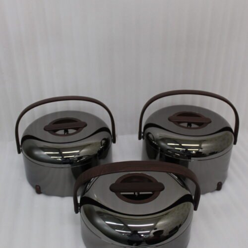 Three modern mirror-finish stainless steel insulated hot pots with wooden arch handles on a kitchen countertop.