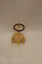 3.6-liter clear glass drink dispenser featuring a gold bear face design, gold spigot, and sturdy wooden stand set on a kitchen counter