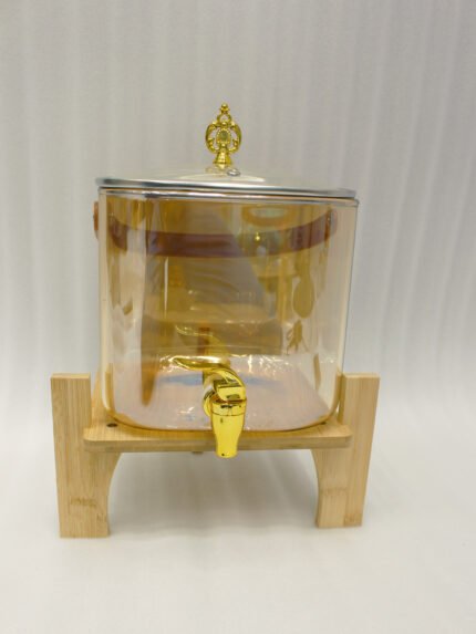 6.5L amber shaded glass beverage dispenser with gold spigot on a wooden stand