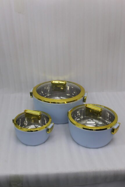 3-piece luxury insulated hotpot set in light blue with gold trim and clear glass lids displayed on a marble kitchen countertop.