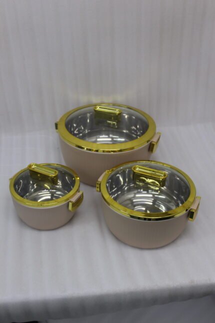 3-piece beige insulated hotpot set with glass lids and gold rims on a white marble countertop