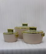 3-piece beige insulated hotpot set with glass lids and gold rims on a white marble countertop