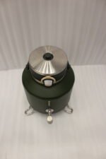 Bangda 5L matte green insulated water cooler jug with stainless steel dispenser tap and metal folding stand on a white marble countertop.