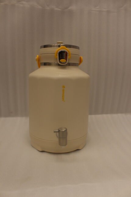 Off-white 7-liter insulated water cooler dispenser with spigot tap and stainless steel lid on a kitchen counter