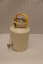 Off-white 7-liter insulated water cooler dispenser with spigot tap and stainless steel lid on a kitchen counter
