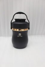 Matte black portable insulated lunch box jar with gold trim accent and black top handle on a kitchen counter