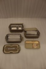 3-in-1 multi-tier beige and brown lunch box stacked on a kitchen countertop