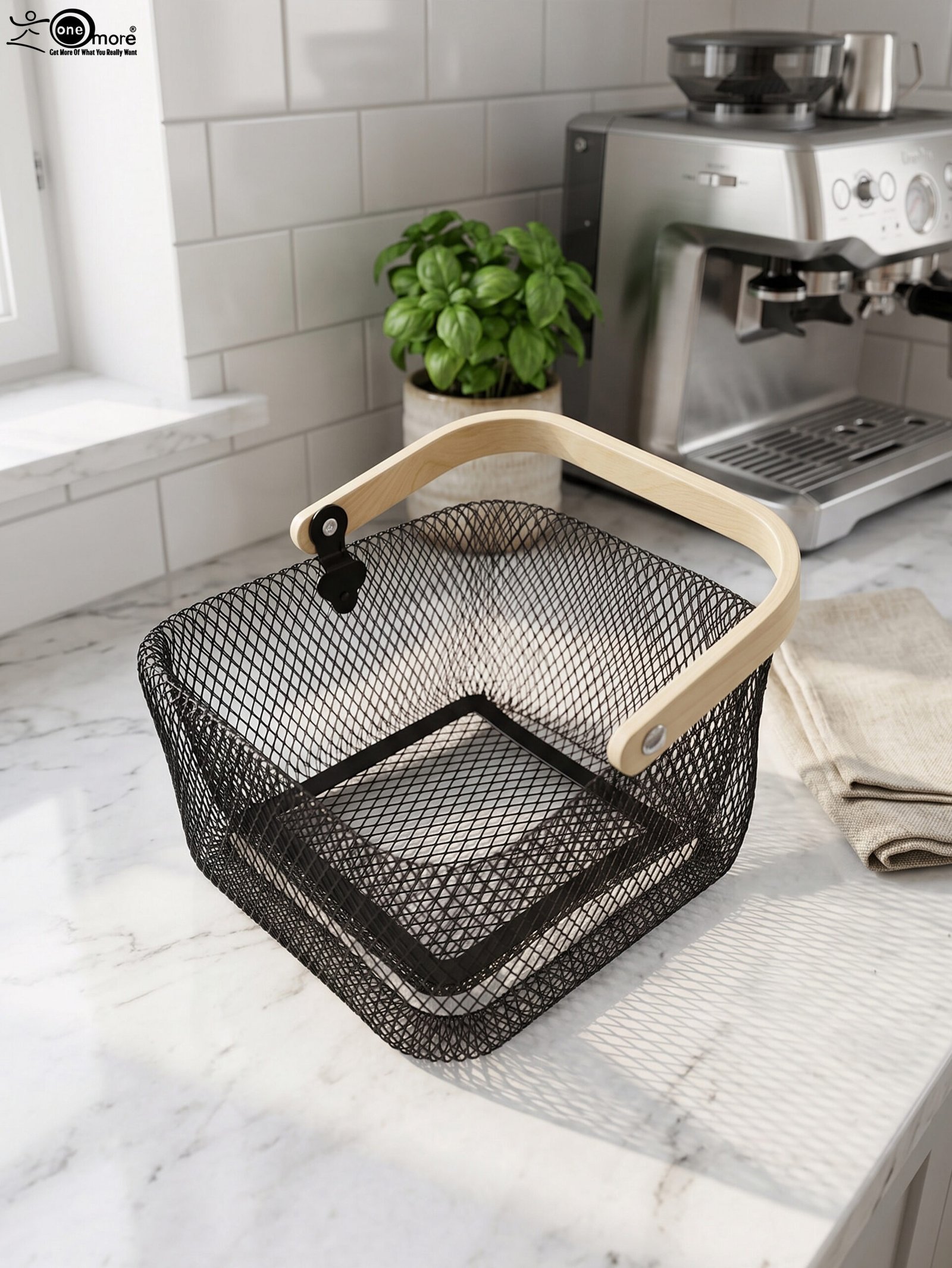 1 Black double-wall wire mesh storage basket with a wooden top handle sitting on a marble kitchen countertop