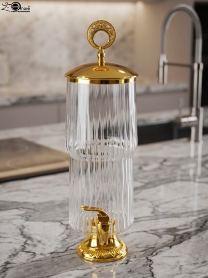 Luxury 3.5 liter ribbed glass beverage dispenser with ornate gold lid handle and gold spigot on a marble countertop