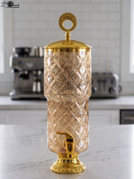 Luxury 3.5L amber diamond-cut glass beverage dispenser with decorative gold lid and spigot on a kitchen counter