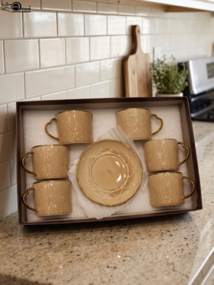 Elegantly boxed beige ceramic 6-person cup and saucer set featuring textured patterns and gold trim handles.