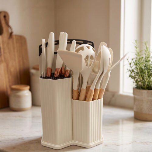 19-piece cream silicone kitchen utensil and knife set with wooden handles arranged in a matching ribbed counter holder