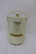Modern cream-colored 2L ribbed water dispenser pitcher with gold accents and carrying handle on a marble kitchen countertop.